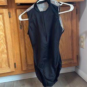 black dance leotard with floral print back with opening. size large adult